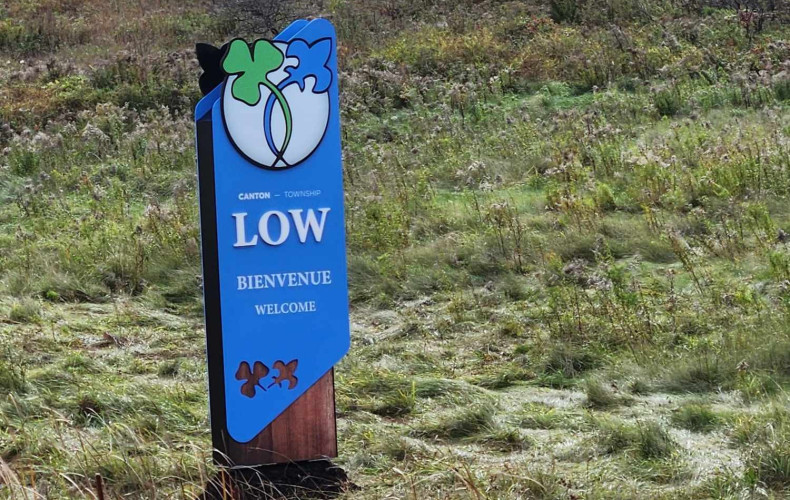 Two New Welcome Signs in Township of Low